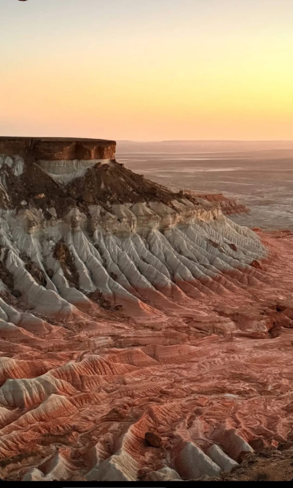 Yangykala Canyon breathtaking landscape view - Red and pink rock formations known as Fire and Ice cliffs Turkmenistan